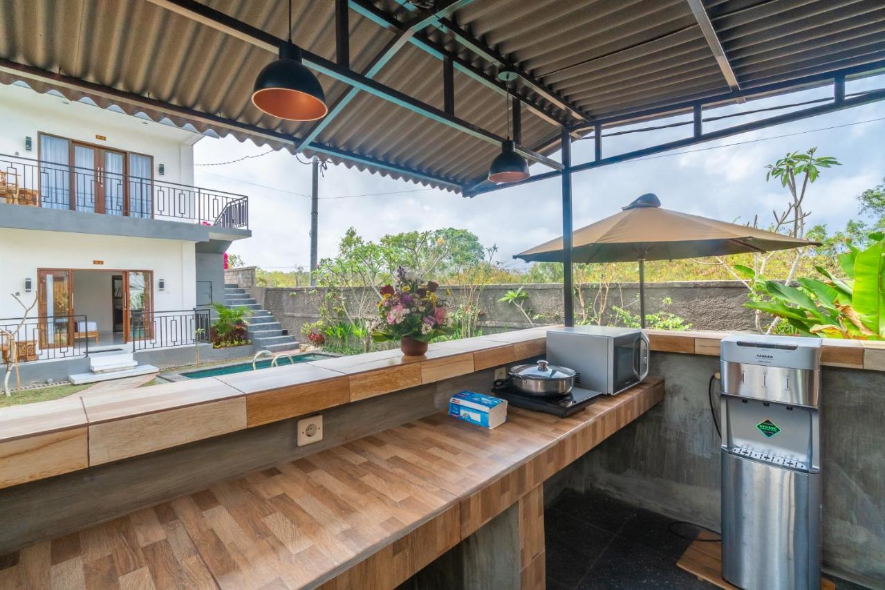 Wooden Puri Guesthouse Улувату Экстерьер фото